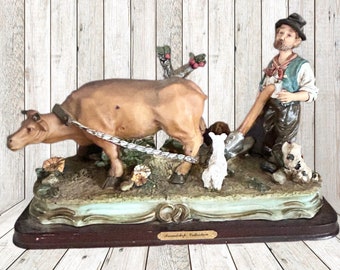 Friendship Collection large resin figurine farmer tilling field with cow vintage 1980s