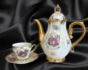 Japanese lusterware vintage 1960s small porcelain coffee pot tea pot with demitasse cup and saucer duo, courting couple theme