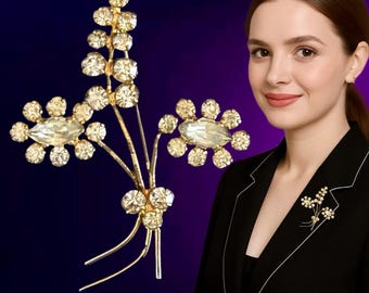 1960s gold finished 6cm floral spray diamante brooch
