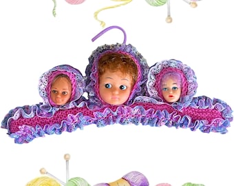 Vintage 1960s cottage craft knitted childs coat hanger with doll faces
