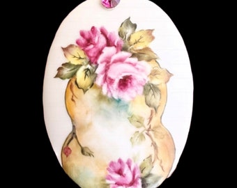 1980s Victorian revival upcycled oval porcelain hand painted brooch, pink roses in vase