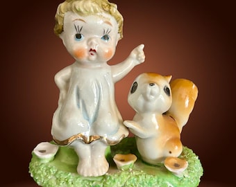 Vintage 1960s small Japanese kitsch porcelain figurine girl with squirrel