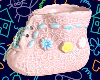 Japanese vintage 1960s kitsch glazed pink small ceramic baby boot planter with shoelace and flower detail, gift idea