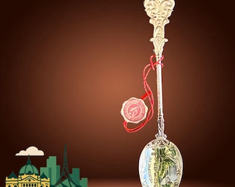 Joneff enamel and silver plate boxed souvenir spoon of Melbourne, made in Czechoslovakia