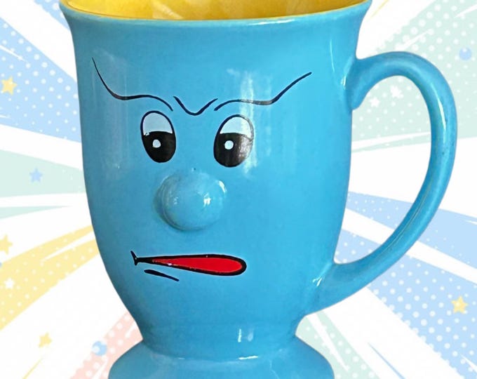 Featured listing image: Vintage 1990s blue and yellow Funny Face collectible mug