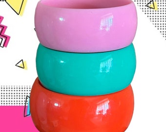 1980s pink, red and mint green acrylic wide stacking bangles movie theatre costume