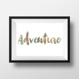 May include: A framed print with the word "Adventure" in a cursive font. The letters are filled with a vintage map design, featuring shades of green, brown, and pink. The frame is black, and the background is white.
