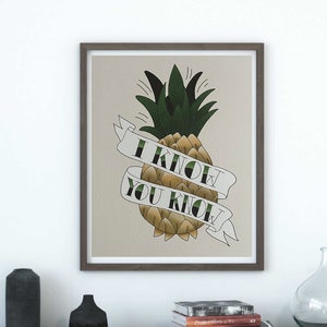 May include: Framed art print featuring a stylized pineapple with green leaves and a banner that reads "I KNOW YOU KNOW". The artwork has a vintage tattoo style with a neutral color palette, suitable for home decor.