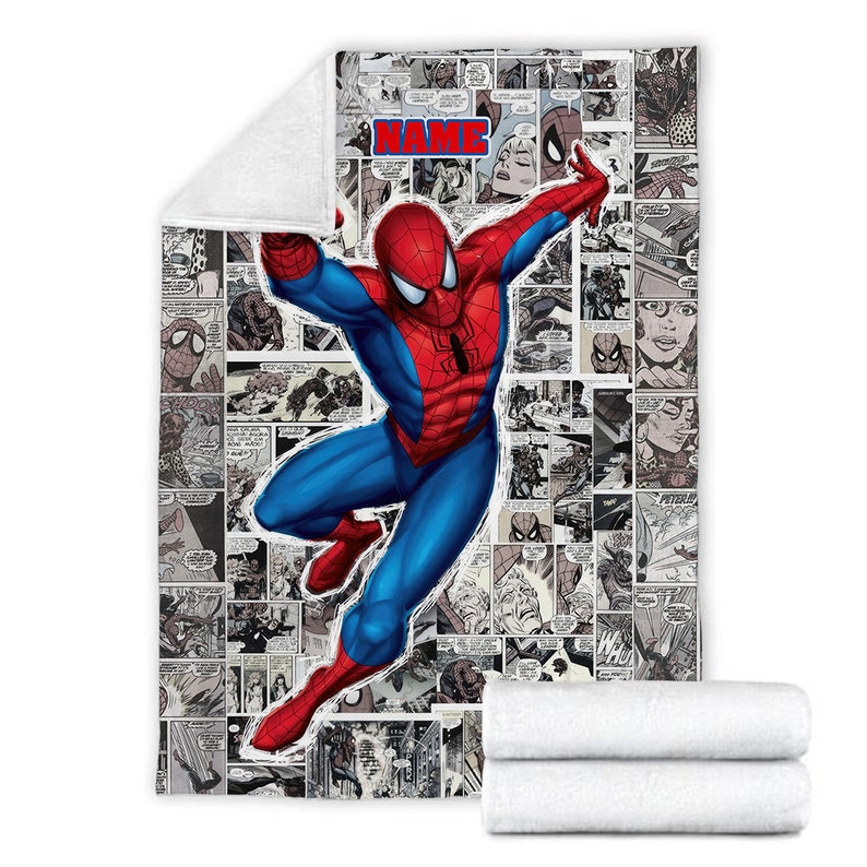 May include: A rectangular fleece blanket featuring a large, central illustration of Spider-Man in a dynamic pose over a black and white comic book panel background. The word NAME is printed in bold red letters at the top. The blanket has a white underside.