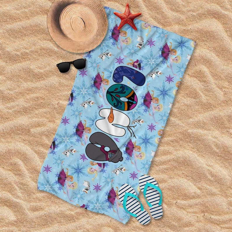 May include: A light blue beach towel with a pattern of snowflakes, cartoon characters, and the word "Snow". The towel is decorated with a straw hat, sunglasses, a red starfish, and a pair of flip-flops.