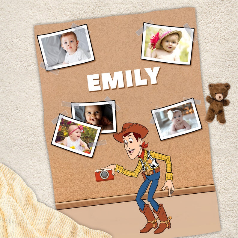 May include: A brown corkboard with a cartoon image of Woody from Toy Story holding a camera. There are five photos of a baby girl pinned to the corkboard. The photos are arranged in a random pattern. The corkboard has the name "EMILY" written in white letters at the top.