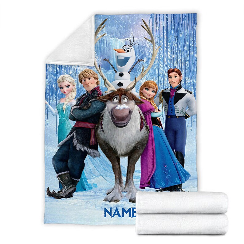 May include: A rectangular fleece blanket featuring a printed scene with characters Elsa, Kristoff, Olaf, Sven, Anna, and Hans against a snowy blue forest background. The bottom of the blanket includes the blue text NAME with space for personalization.
