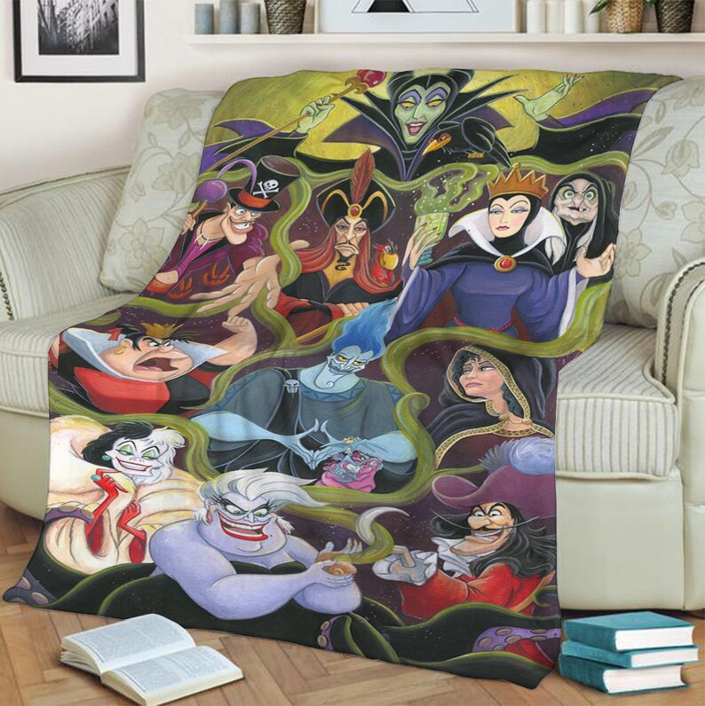 May include: A colorful throw blanket featuring a group of Disney villains, including Maleficent, Ursula, Cruella de Vil, and Captain Hook. The villains are depicted in their iconic poses and costumes, with a dark and whimsical background.