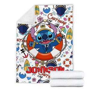 May include: A white and blue patterned fleece blanket featuring a cartoon Stitch character wearing a captain's hat and life preserver. The text "Castaway Cap" and "Johnson" are on the blanket.
