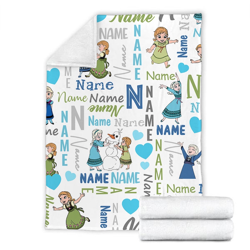 May include: A white fleece blanket featuring a repeating pattern of cartoon characters Anna, Elsa, and Olaf. The design includes the word Name in various blue, green, and gray fonts, interspersed with light blue hearts and large capital letters.