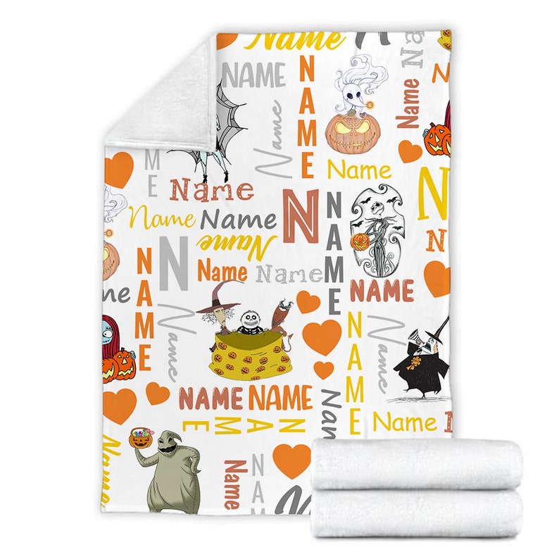 May include: A white fleece blanket featuring a repeating pattern of characters from The Nightmare Before Christmas, including Jack Skellington, Sally, Zero, and Oogie Boogie, interspersed with orange hearts and the word Name in various fonts.