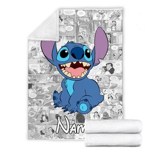 May include: A rectangular fleece blanket featuring a large, colourful illustration of the blue alien character Stitch centred over a black and white comic book panel background. The word Name is printed in white at the bottom of the blanket.
