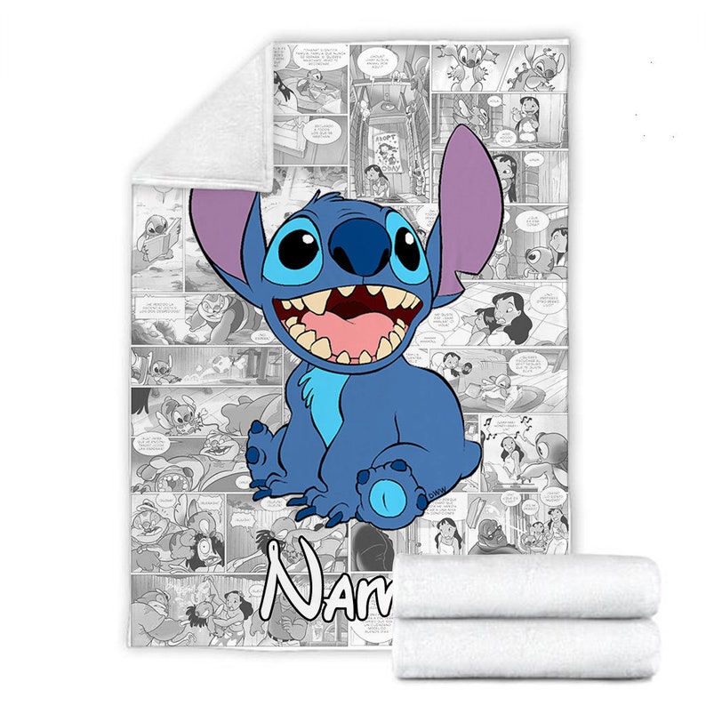 May include: A rectangular fleece blanket featuring a large, colourful illustration of the blue alien character Stitch centred over a black and white comic book panel background. The word Name is printed in white at the bottom of the blanket.
