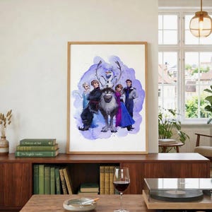 May include: A framed watercolor print featuring characters from the animated film "Frozen." The artwork showcases Elsa, Anna, Kristoff, Sven, Olaf, and Hans against a backdrop of purple watercolor splashes. The print is displayed in a wooden frame.