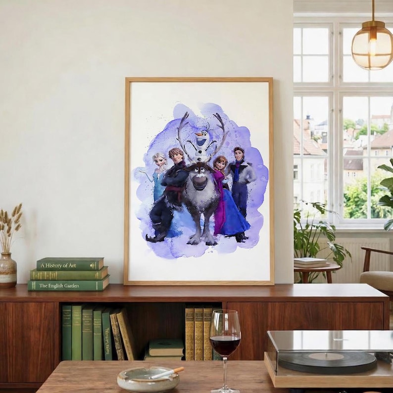 May include: A framed watercolor print featuring characters from the animated film "Frozen." The artwork showcases Elsa, Anna, Kristoff, Sven, Olaf, and Hans against a backdrop of purple watercolor splashes. The print is displayed in a wooden frame.