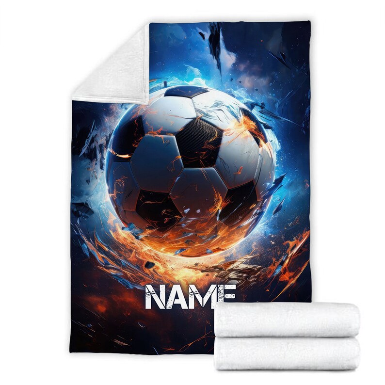May include: A soccer ball engulfed in flames against a blue and orange background. The text "NAME" is printed below the ball.
