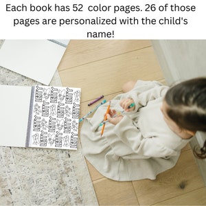 May include: A black and white coloring book with a repeated pattern of airplanes and the name "LETTY" on each page. A child is coloring in the book with colored pencils.