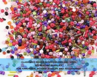 May include: A vibrant assortment of glass seed beads in various colors and sizes. The beads are a mix of red, pink, purple, green, and other colors. Text on the image reads: GLASS SEED BEADS, MIXED COLORS AND SIZES, DIY BEADING SUPPLIES, FOR HANDMADE, BEADED JEWELRY AND ACCESSORIES.