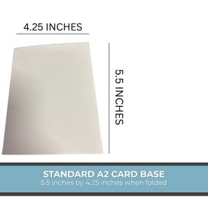 May include: A white A2 card base, measuring 5.5 inches by 4.25 inches when folded. The dimensions are clearly labeled with the text "4.25 INCHES" and "5.5 INCHES". The text "STANDARD A2 CARD BASE" is also included.