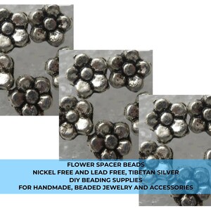 May include: A collection of small, silver-colored metal flower spacer beads with five petals and a central circular detail. The text on the image reads: FLOWER SPACER BEADS, NICKEL FREE AND LEAD FREE, TIBETAN SILVER, DIY BEADING SUPPLIES.
