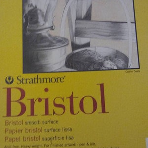 May include: A yellow Strathmore Bristol pad with a pencil drawing of a still life. The pad includes the text "Bristol" in large red letters, and details about the paper's weight and dimensions: 9 in x 12 in.