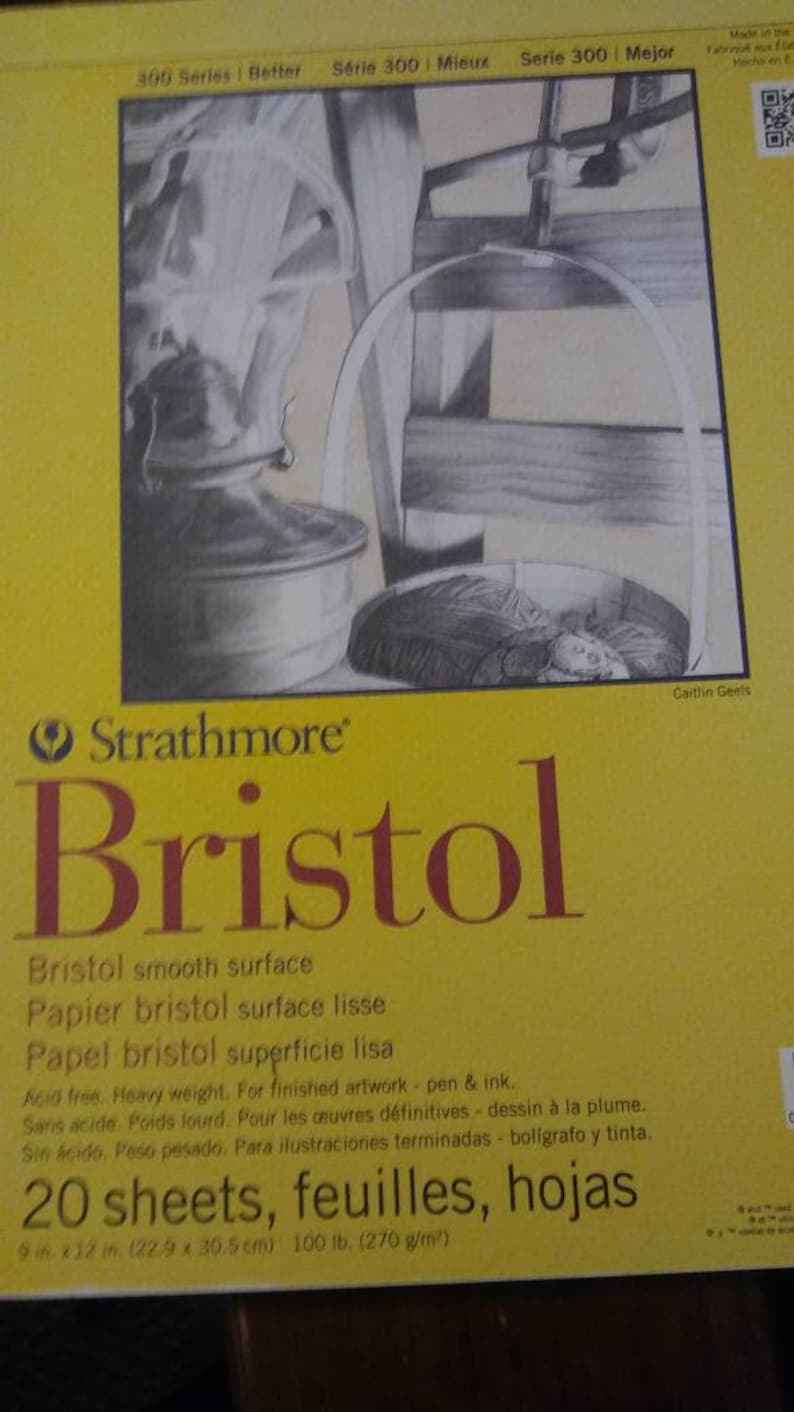 May include: A yellow Strathmore Bristol pad with a pencil drawing of a still life. The pad includes the text "Bristol" in large red letters, and details about the paper's weight and dimensions: 9 in x 12 in.