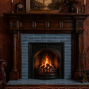May include: A dark wood fireplace mantel featuring intricate carved details and columns, surrounding a black arched metal firebox with a burning fire. The fireplace surround is constructed from blue rectangular tiles with a matching hearth.