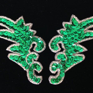 Emerald green cup sequined leaves edged with silver seed beads. Holiday decoration. Made in India. 1 pair per lot.