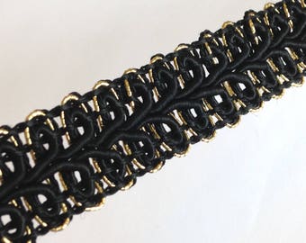 Black and Gold Trim, shiny rayon gimp intertwined with sparkling lurex, 3-4" wide, vintage, offered in 1 lot of 22 yards.