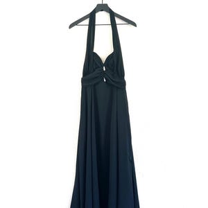 May include: A black halter-style maxi dress with a gathered detail at the bust and a flowing skirt.