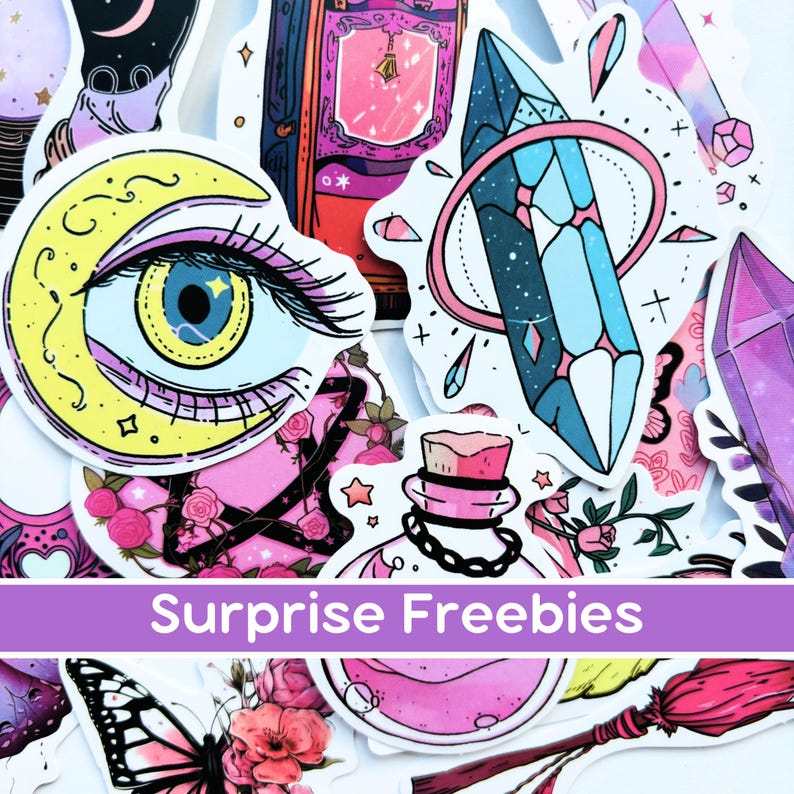 May include: A collection of colorful stickers with mystical and celestial themes. Designs include a crescent moon with an eye, crystals, potion bottles, and a butterfly. The text "Surprise Freebies" is displayed on a purple banner.