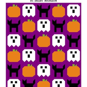 May include: A quilt titled Ghostly Whiskers by Shelby McCollum featuring a repeating pattern of orange pumpkins, white ghosts, and black cats on a purple background. The quilt measures 66 inches by 79 inches and displays a pixelated design.