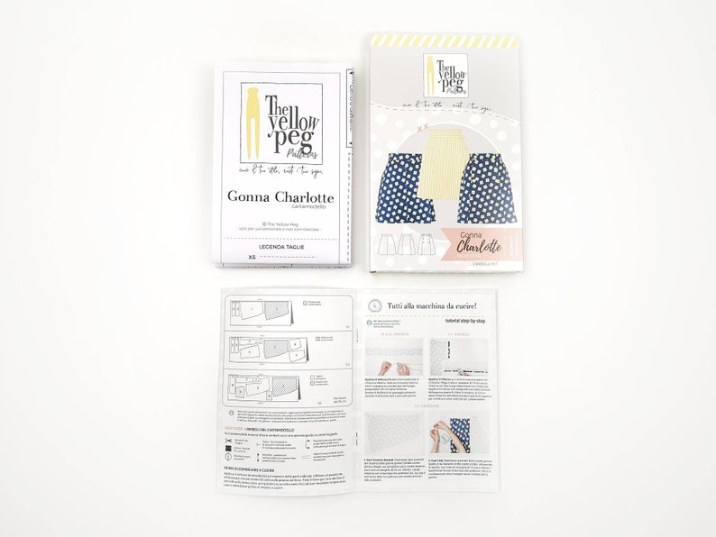 May include: A sewing pattern for a skirt called "Gonna Charlotte" by The Yellow Peg Patterns. The pattern includes instructions and diagrams for sewing the skirt. The pattern is for size XS.