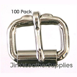 May include: A pack of 100 silver-toned metal buckles, each measuring approximately 1 inch in length. The buckles are designed for use with straps or belts.