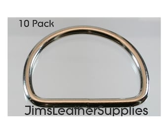 May include: A pack of 10 silver D-rings. The rings are smooth and shiny.  The rings are about 1 inch in diameter.  The text "10 Pack" and "JimsLeatherSupplies" are visible in the image.