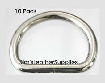 May include: A pack of 10 silver D-rings. The rings are smooth and shiny. The text "Jim's Leather Supplies" is visible on the ring.