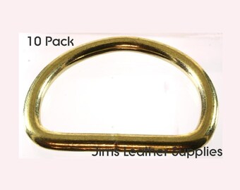 May include: A pack of 10 gold-colored metal D-rings. The rings are about 1 inch in diameter.