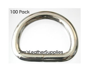 May include: 100 pack of silver metal D-rings. The rings are about 1 inch in diameter.