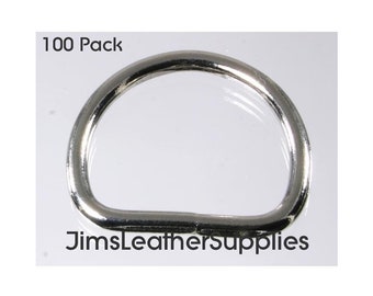May include: A pack of 100 silver metal D-rings. The rings are about 1 inch in diameter.
