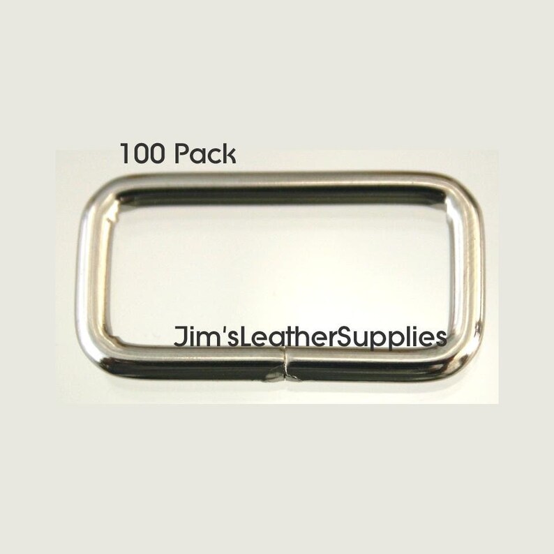 A pack of 100 1 inch nickel plated steel belt keepers or loops.