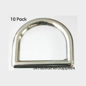 May include: A pack of 10 silver D-rings. The rings are about 1 inch in diameter and have a smooth, polished finish.