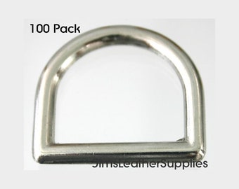 May include: A pack of 100 silver-toned metal D-rings. The D-rings are approximately 1 inch in diameter.