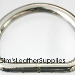 May include: Silver D-ring hardware for leather crafting projects.  The ring is smooth and polished with a rounded edge.  Jim's Leather Supplies.