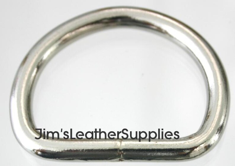 May include: Silver D-ring hardware for leather crafting projects.  The ring is smooth and polished with a rounded edge.  Jim's Leather Supplies.