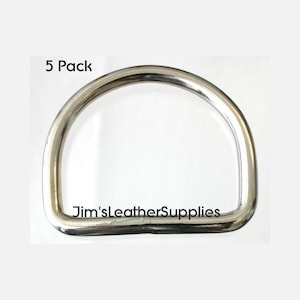 May include: Five pack of silver metal D-rings. The rings are smooth and have a polished finish. Jim's Leather Supplies is printed on the bottom of the ring.